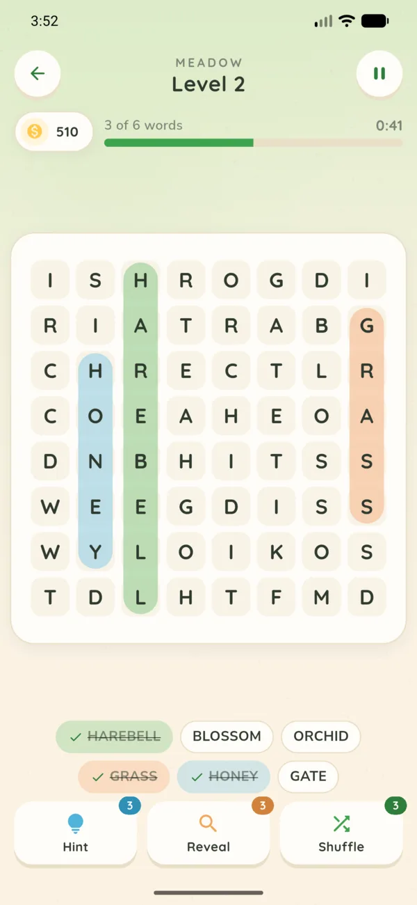 Word Search Haven gameplay: an 8 by 8 letter grid on warm paper with three found words highlighted in soft green, peach and blue bands